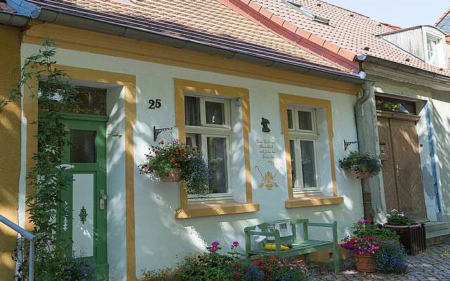 Historisches Haus mit Blumen in Rheinsberg Historisches Haus mit Blumen in Rheinsberg